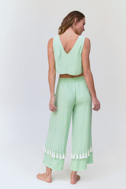 Pantalon soyeux à pompons 