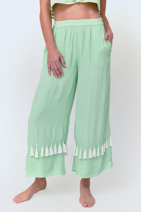 Pantalon soyeux à pompons 